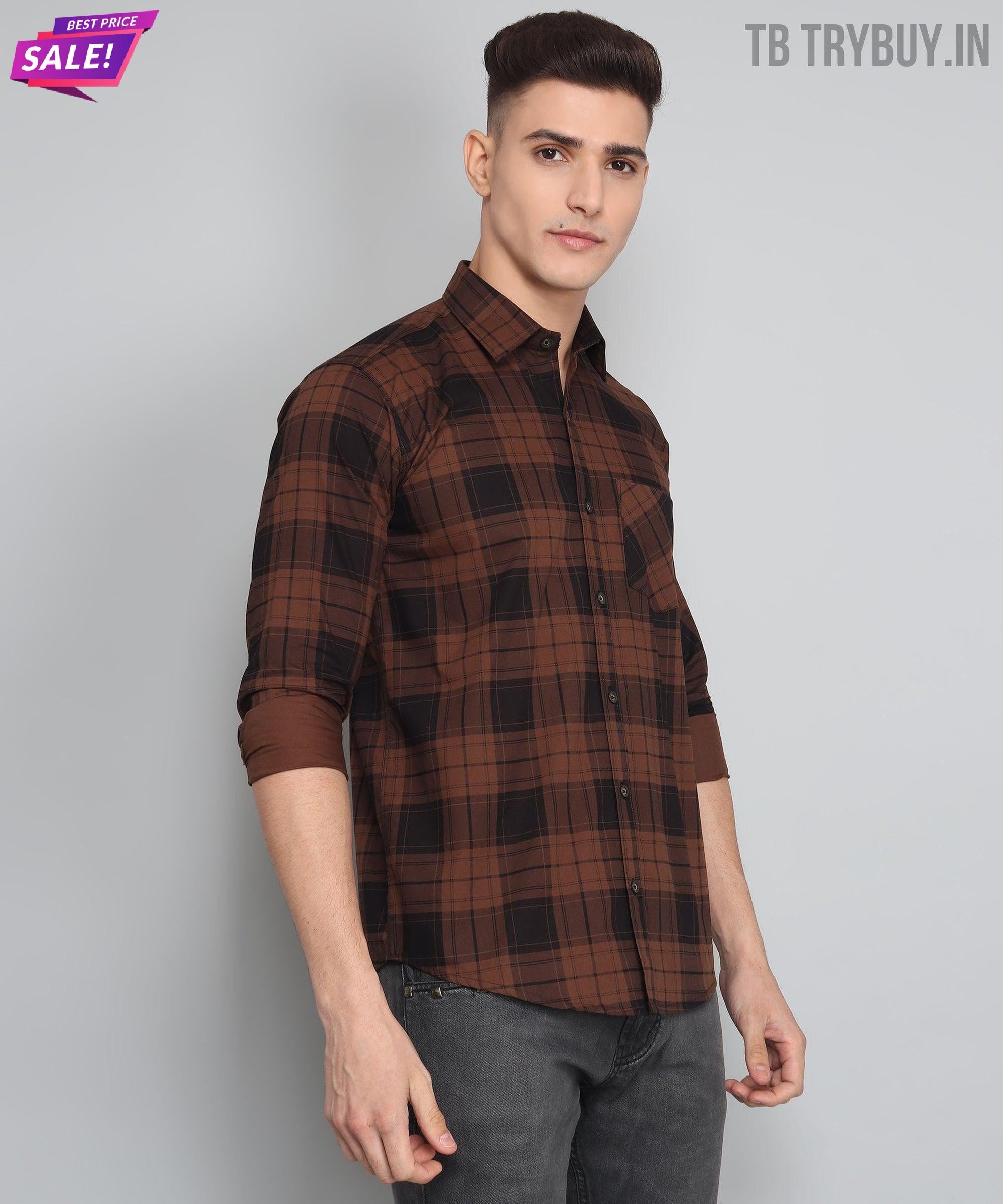 a young man wearing a brown and black checkered shirt