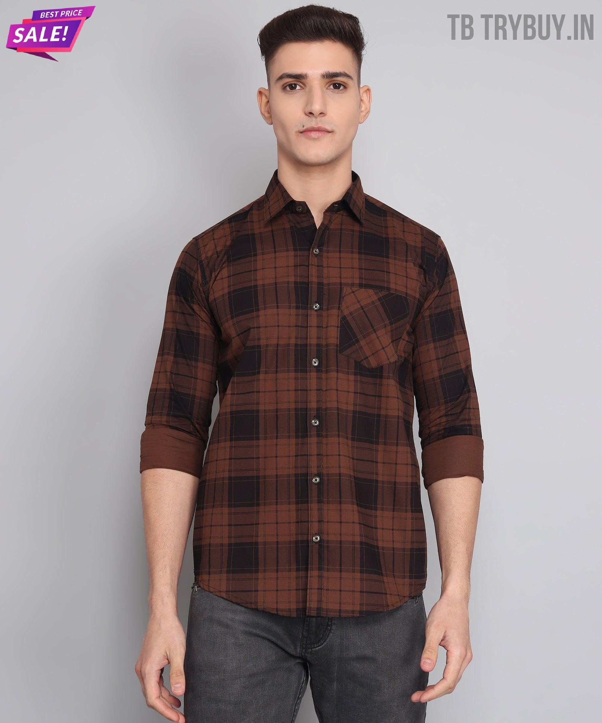 a man wearing a brown and black plaid shirt