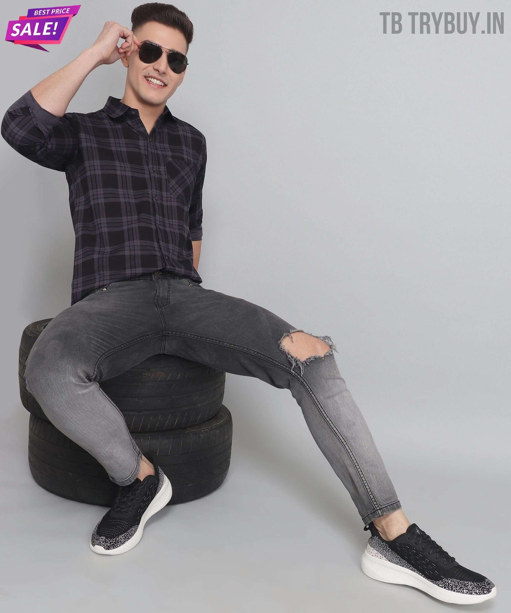 a man sitting on top of a round object