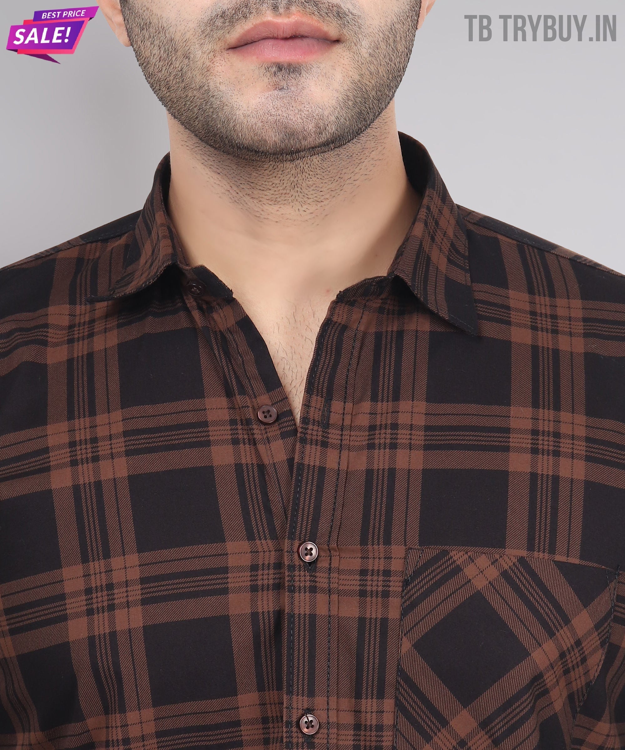 a close up of a person wearing a plaid shirt