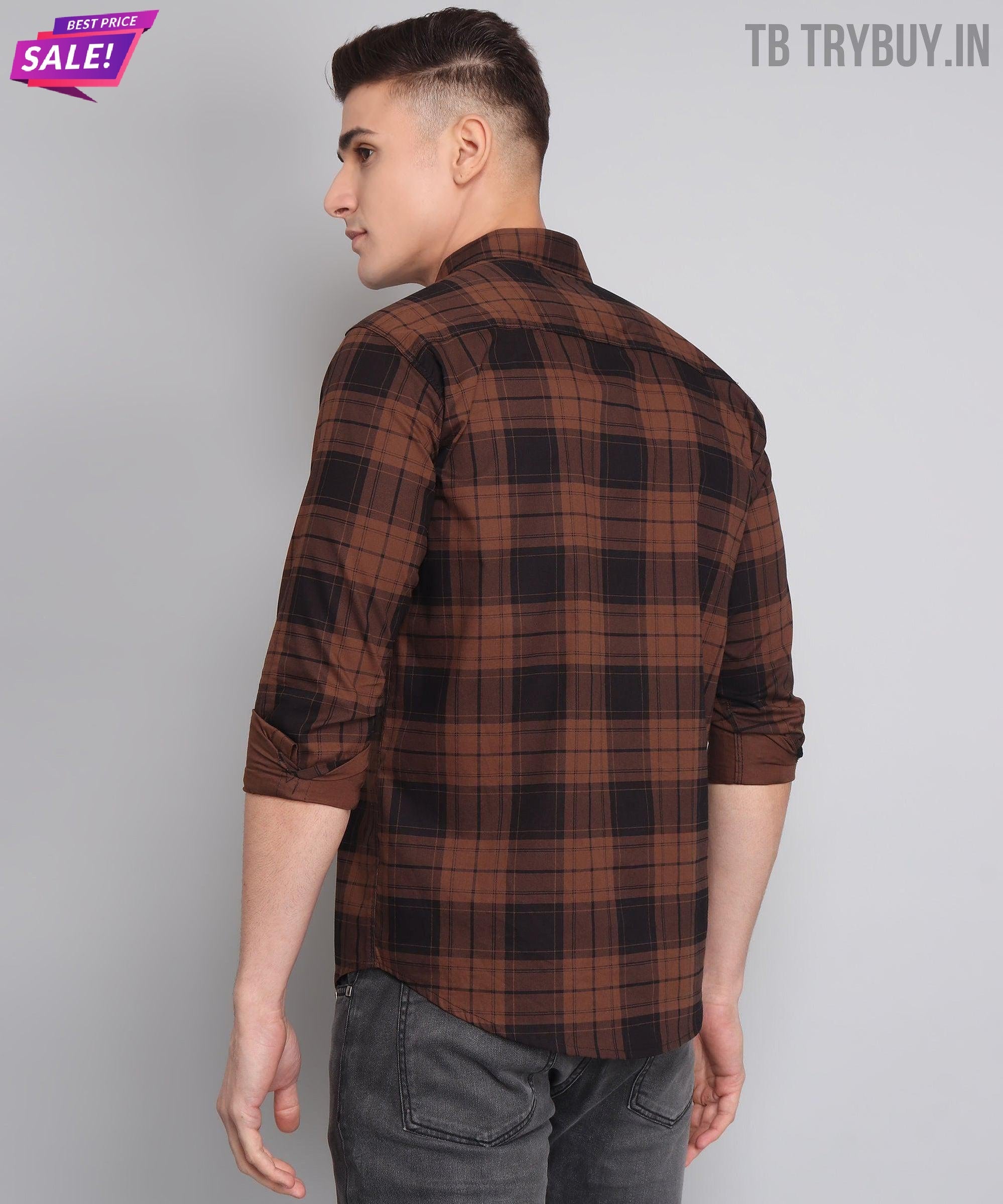 a man wearing a brown and black checkered shirt