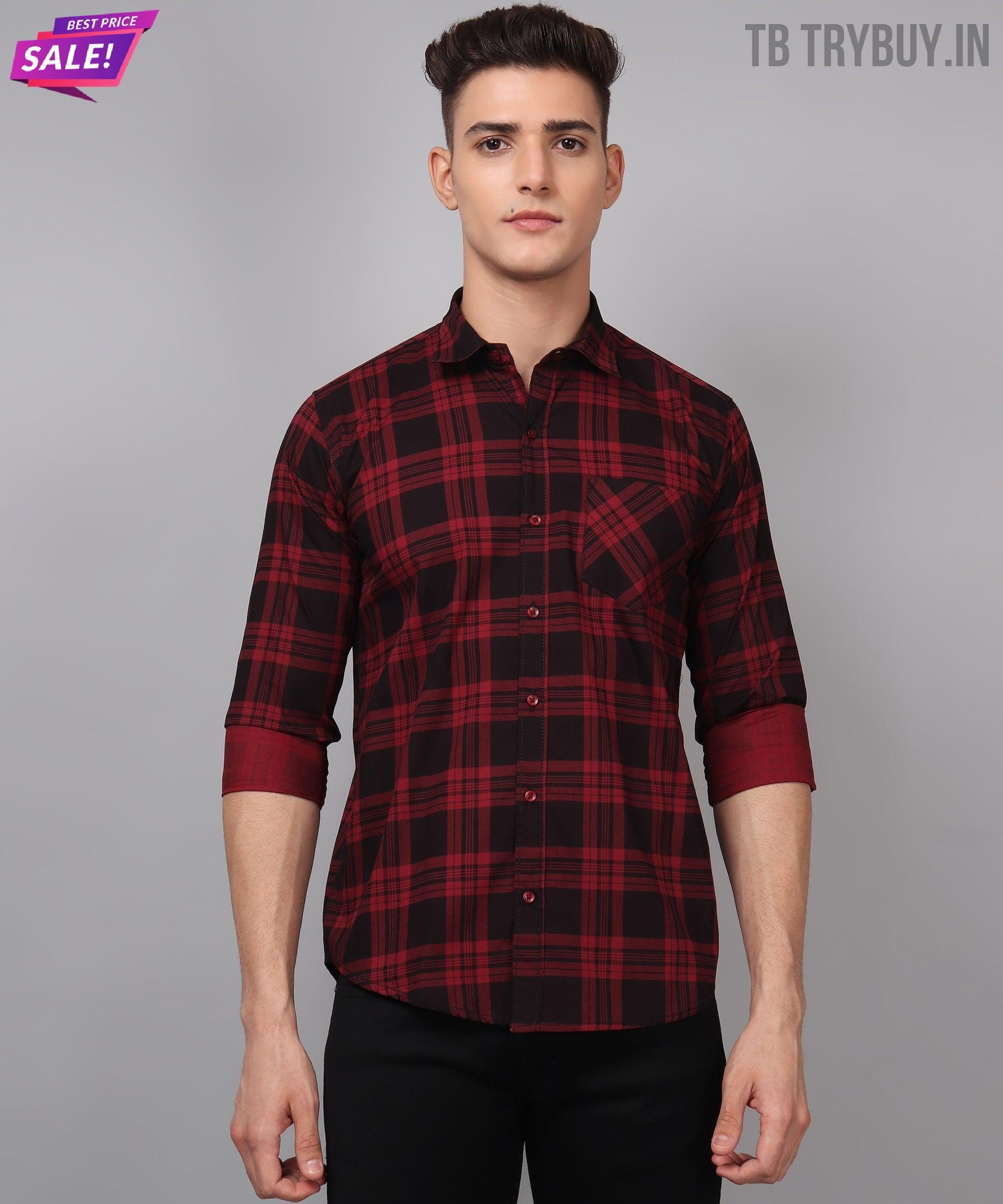 a man wearing a red and black plaid shirt