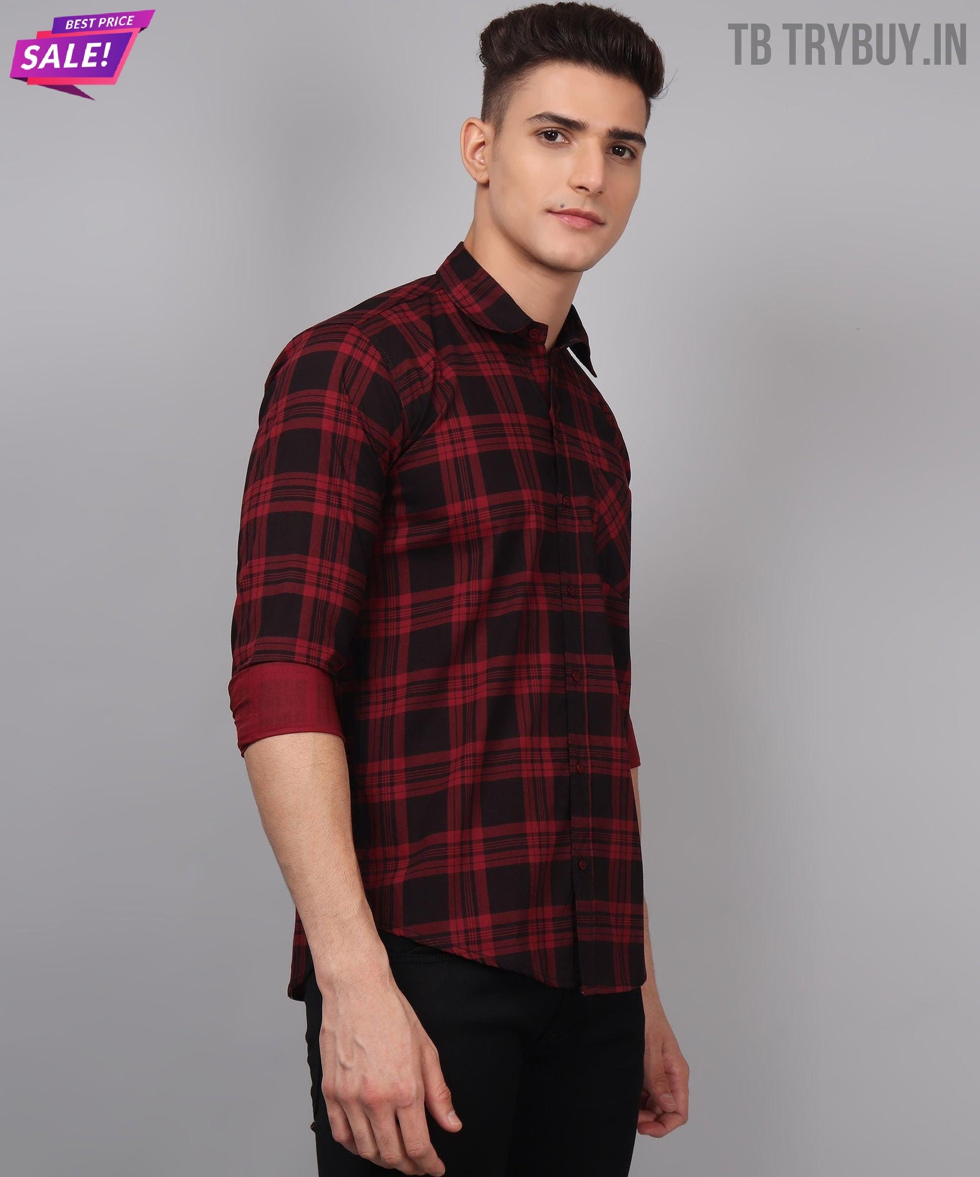 a man wearing a red and black plaid shirt