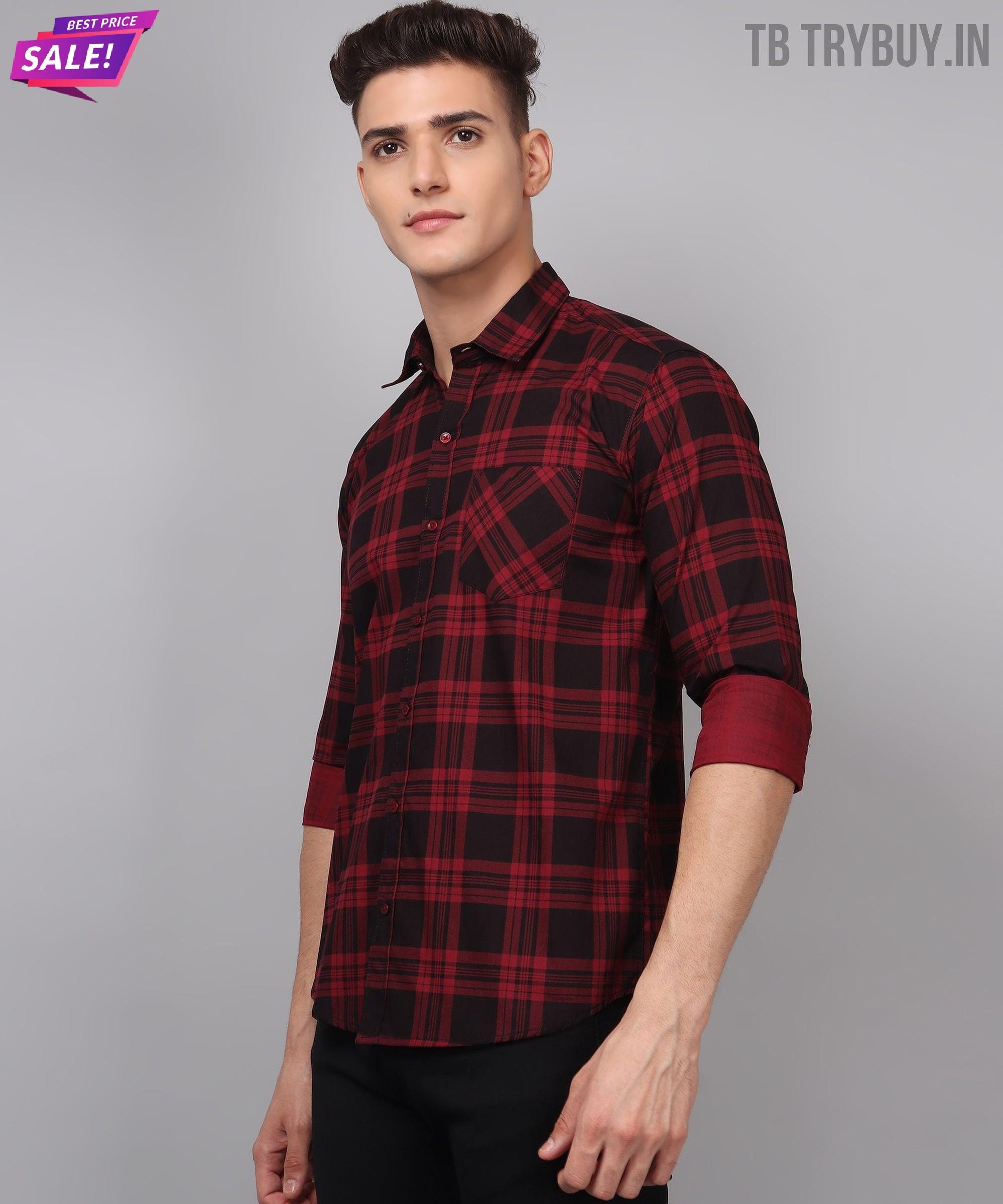 a man wearing a red and black plaid shirt