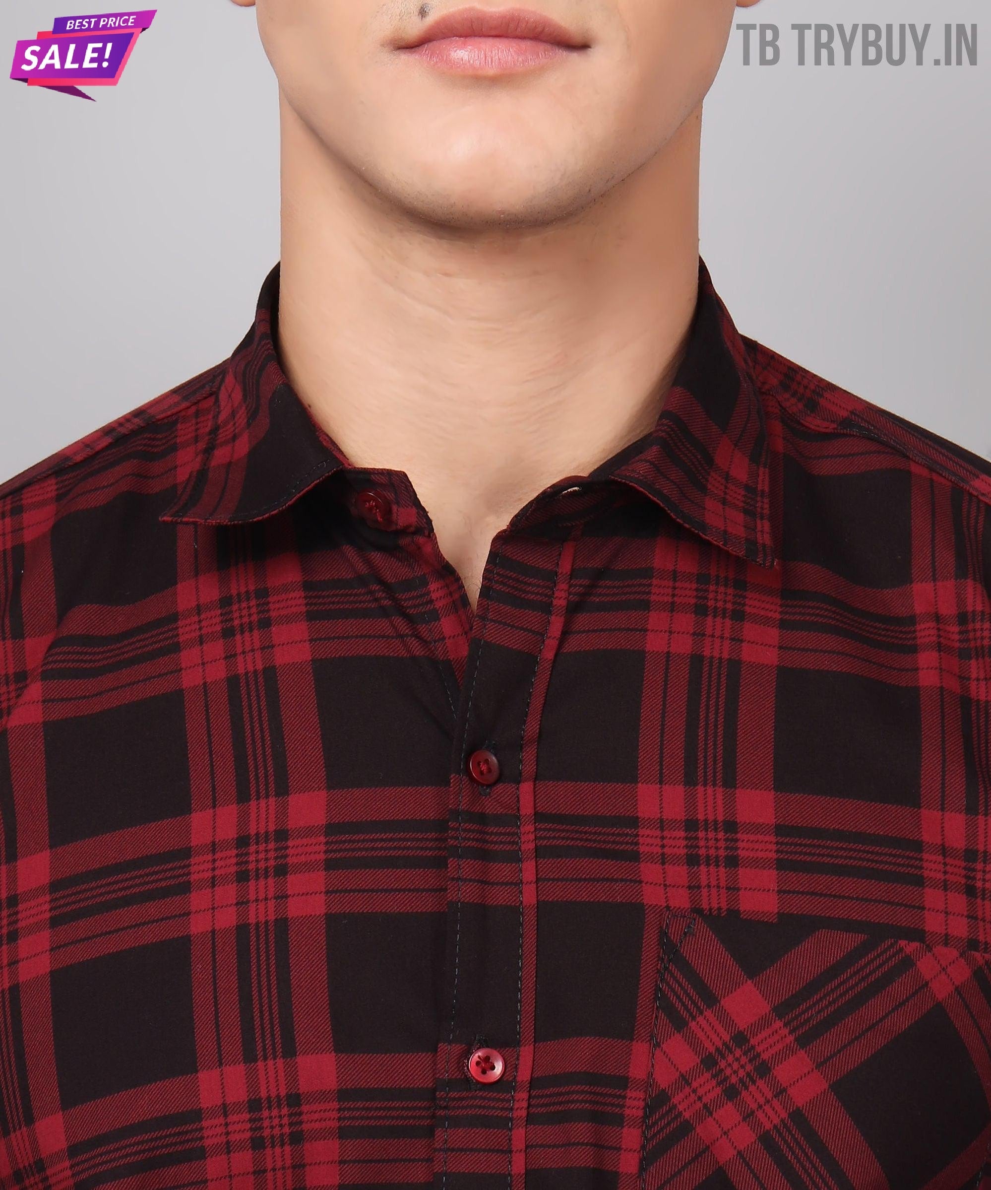 a man wearing a red and black plaid shirt