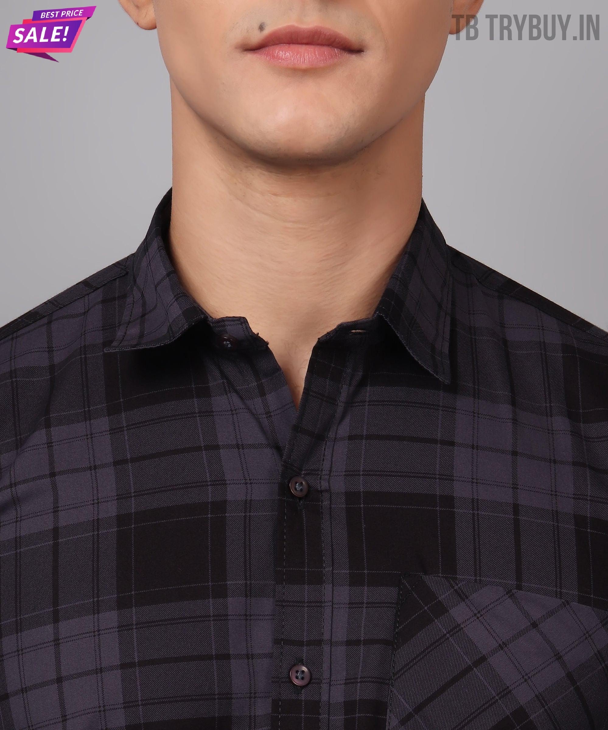 a man wearing a black and white checkered shirt