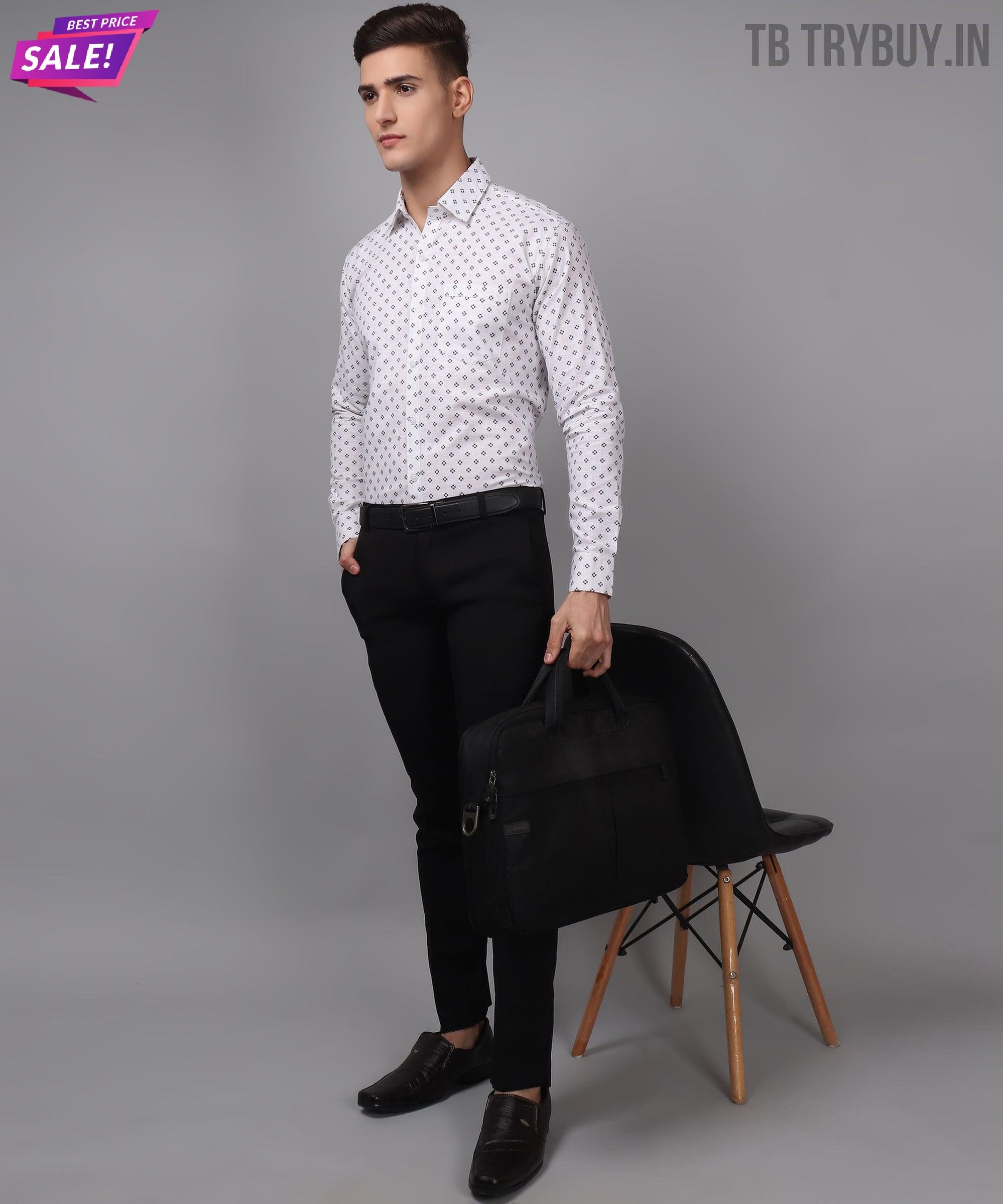 a man in a white shirt and black pants holding a black bag