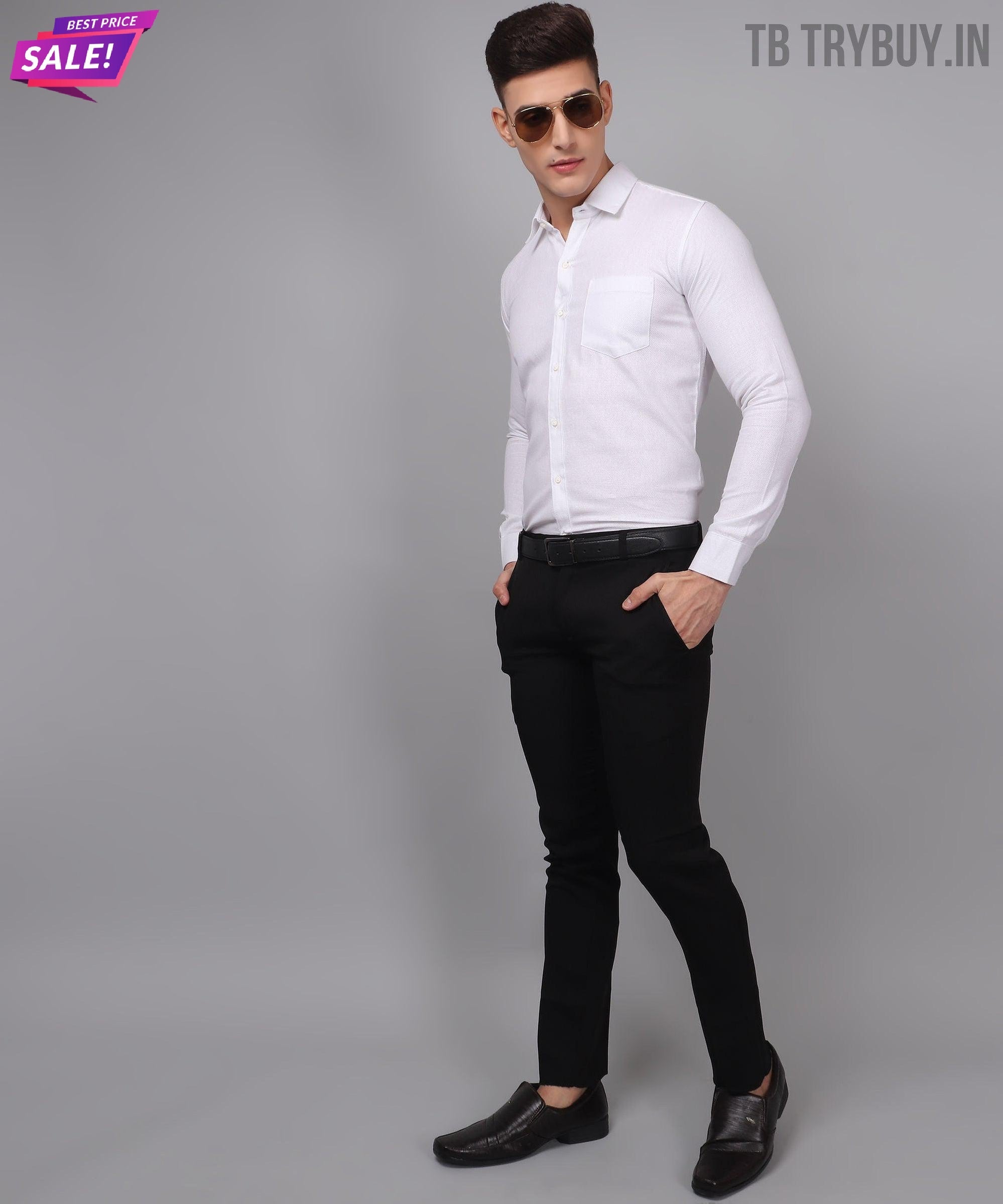 a man in a white shirt and black pants