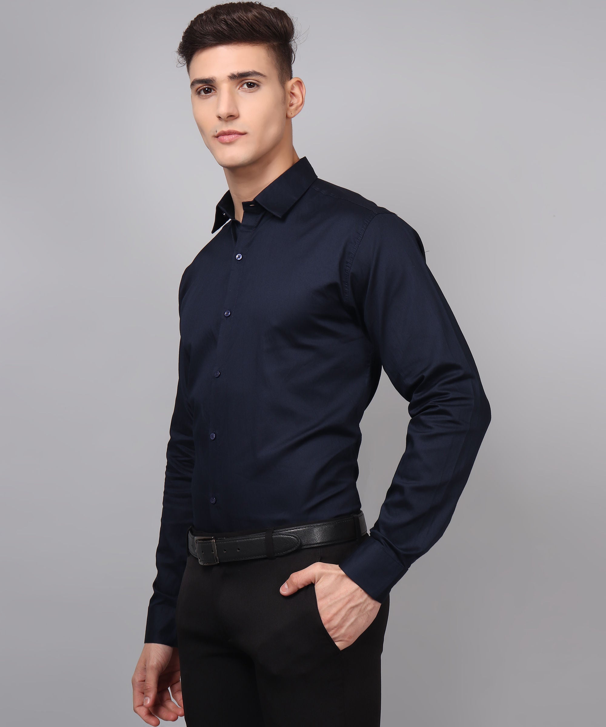 a man wearing a black shirt and black pants