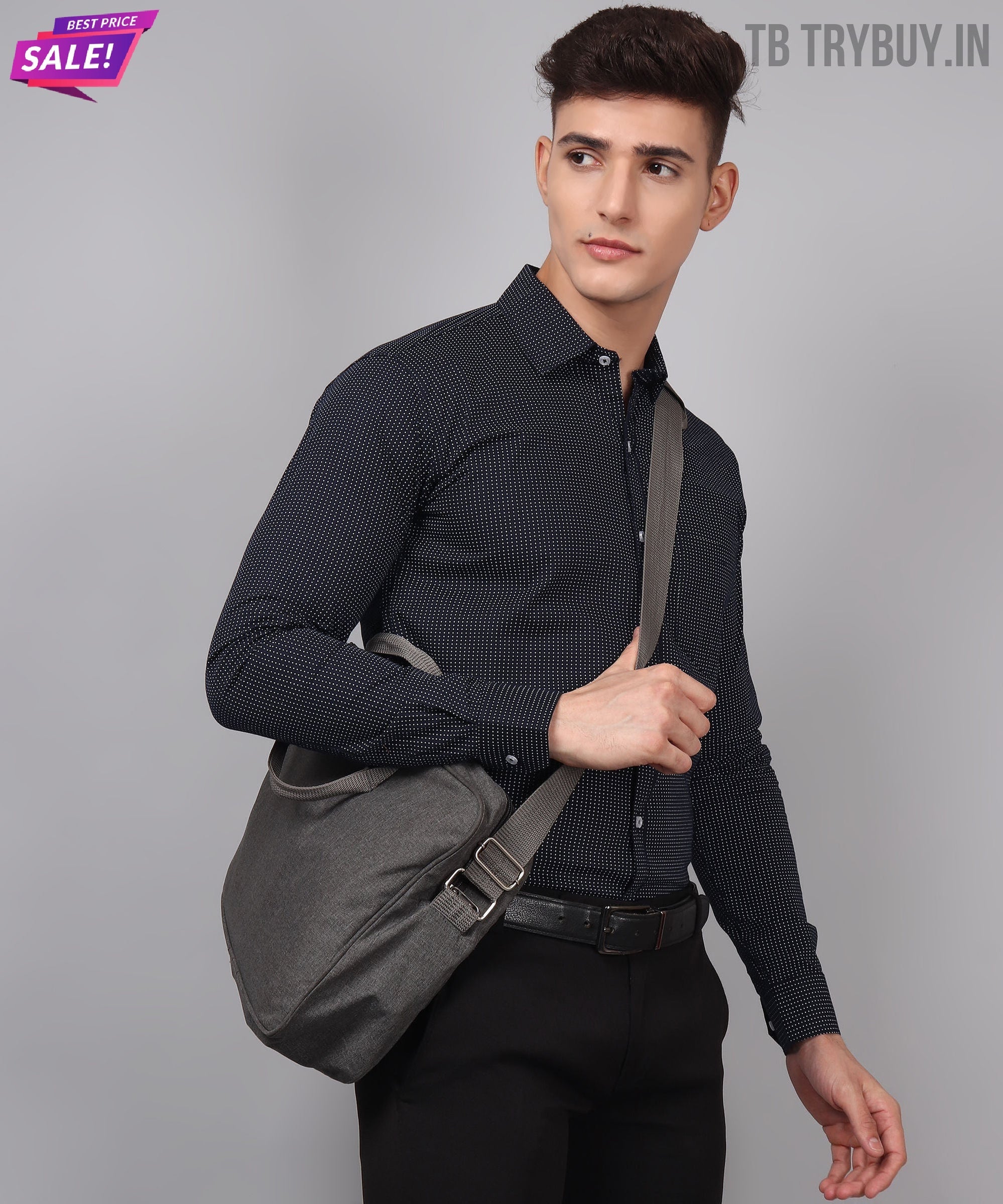 a man in a black shirt is holding a gray bag