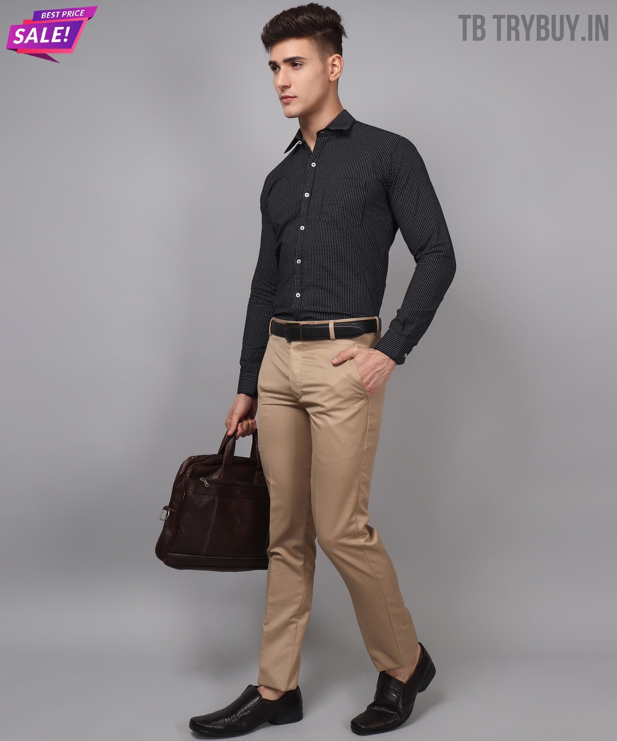 a man in a black shirt and khaki pants