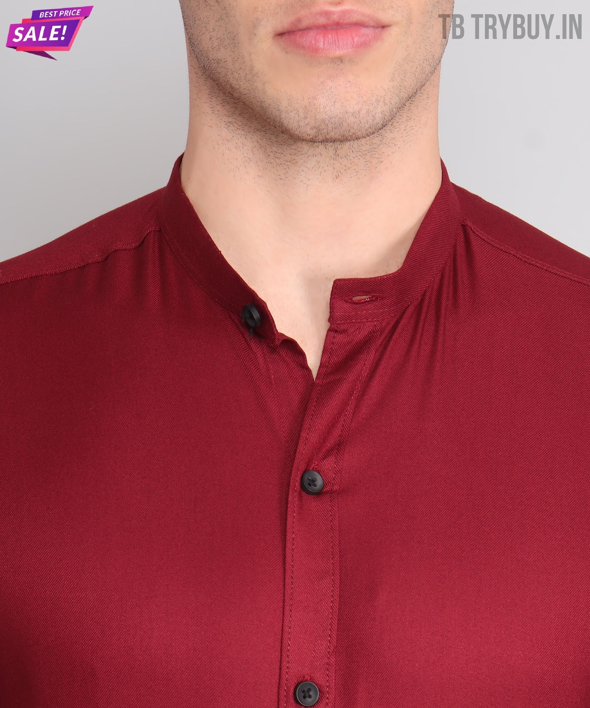 a close up of a man wearing a red shirt