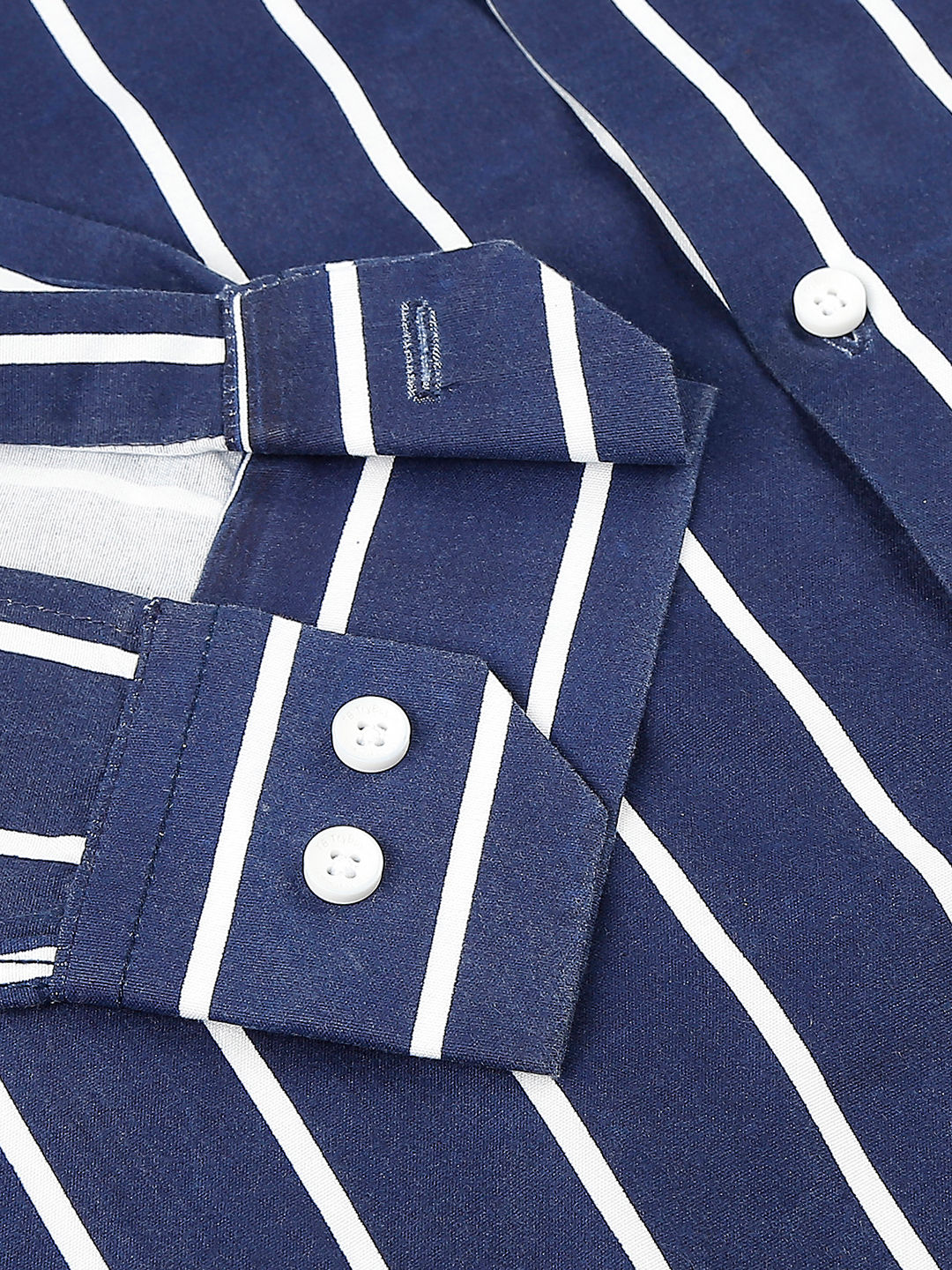 a close up of a blue and white striped shirt