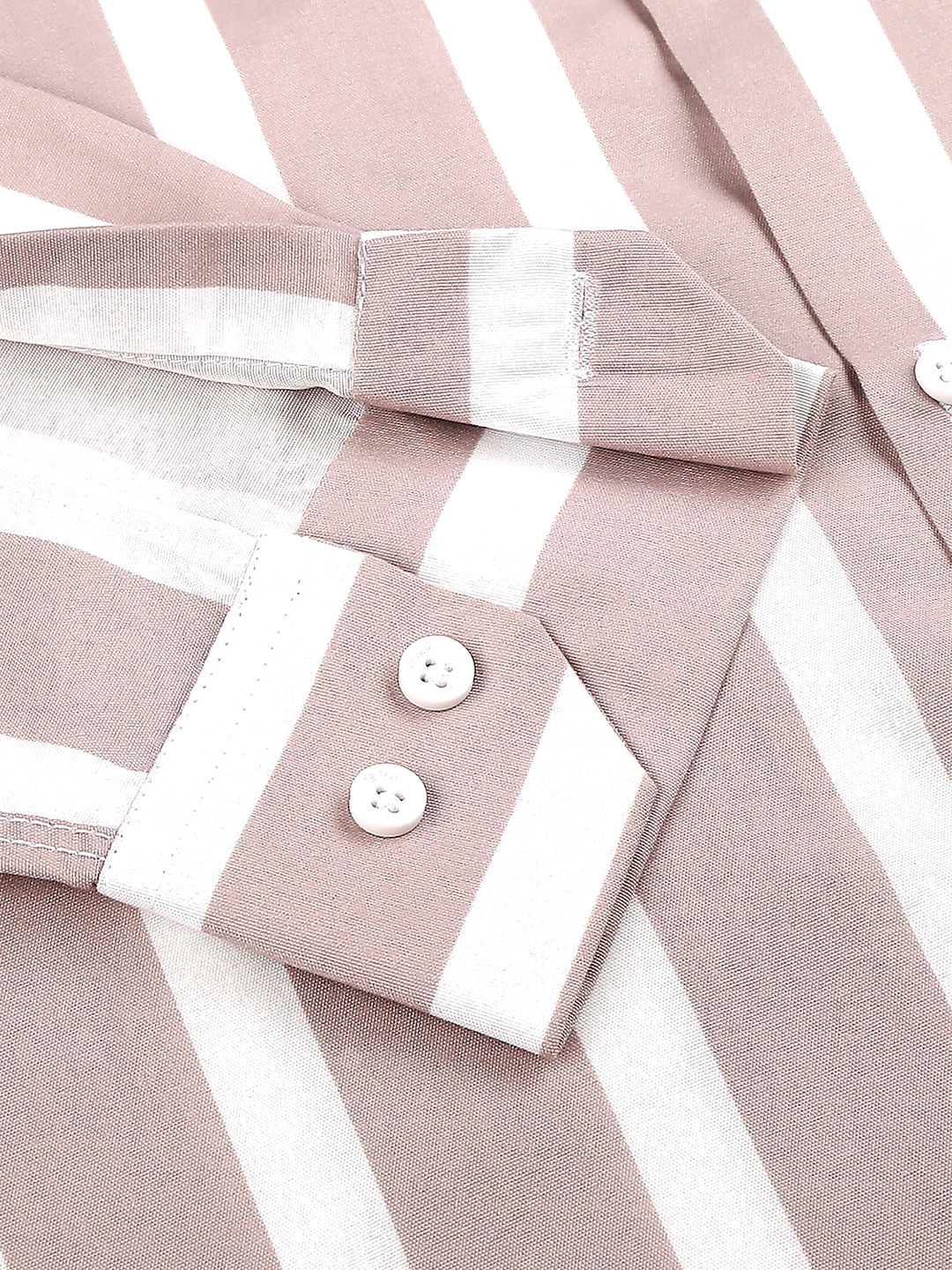 a close up of a pink and white striped shirt