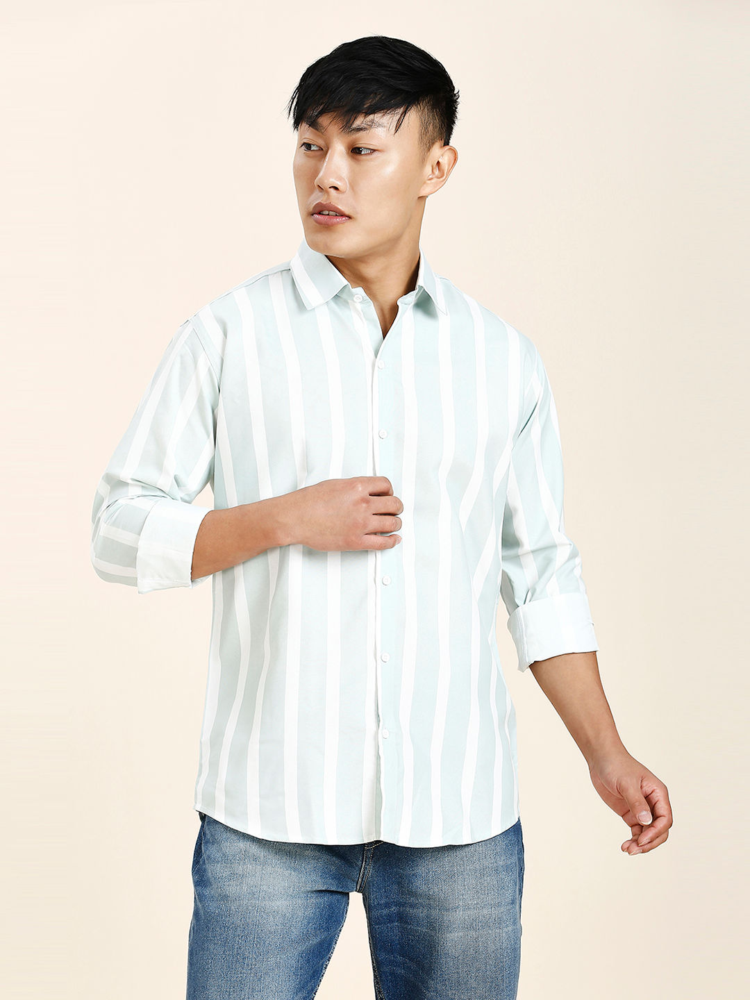 a man in a white and blue striped shirt