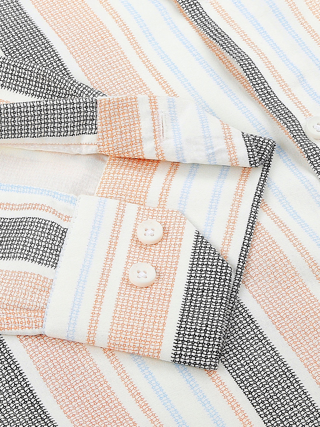 a close up of a striped shirt with buttons