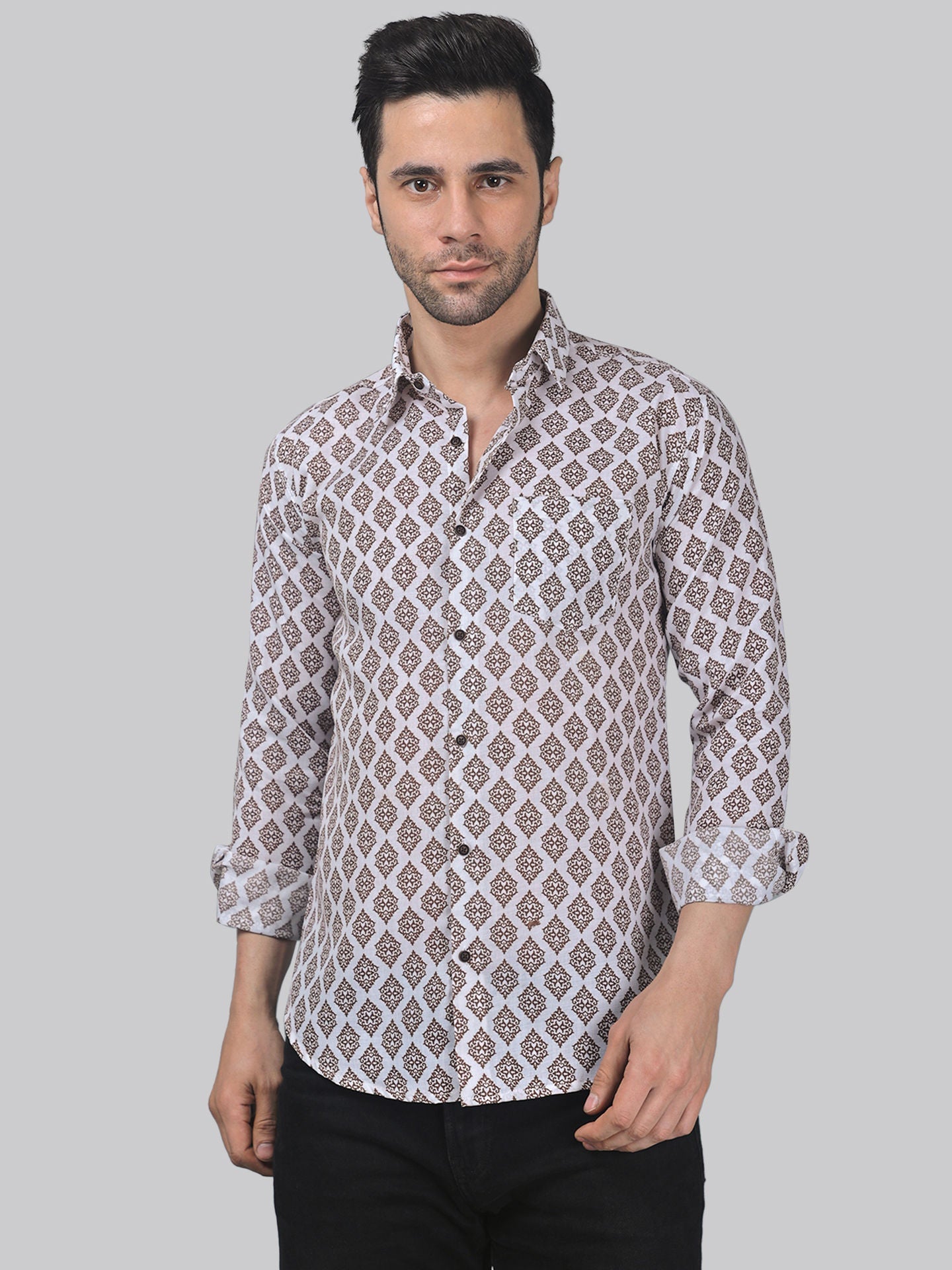 a man wearing a shirt with a pattern on it